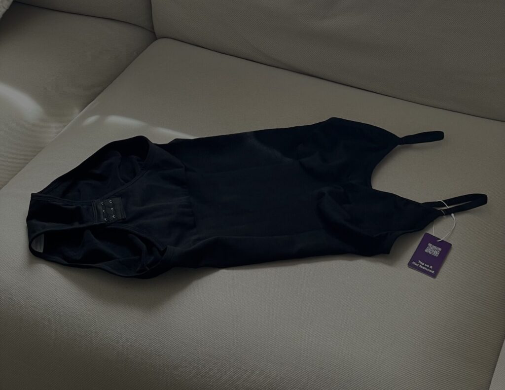HeyShape bodysuit flat lay with tag